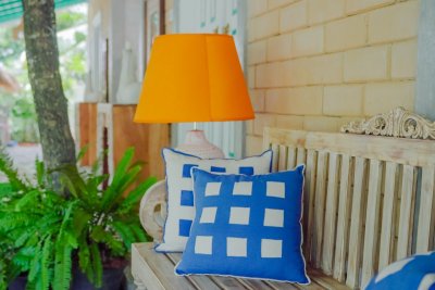 Warme kleuren en brede strepen veroveren je terras